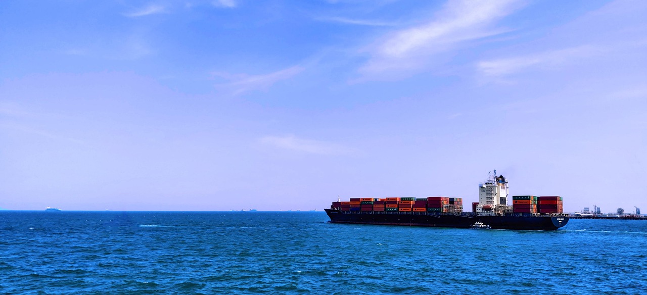 cargo ship containers port logistics maritime